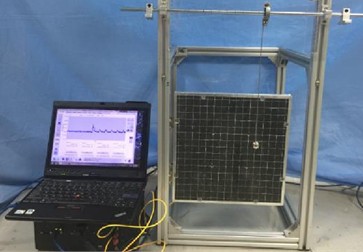 Experimental setup for low-velocity impact tests. Photo taken by Zhaoyu Zheng in 2021 at the State Key Laboratory of Structural and Mechanical Engineering, Nanjing University of Aeronautics and Astronautics