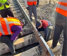 Installation process of under-sleeper elastic pads in the rail joint zone. Photos by the second author on November 21, 2025, illustrate the process of experimental studies on the installation of elastic pads