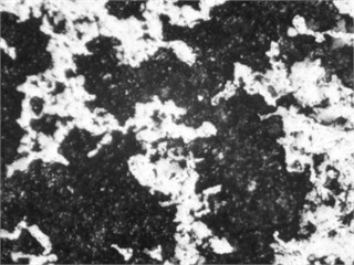 Microstructure of the steel surface: a) before ferritic nitrocarburizing (x800);  b) after ferritic nitrocarburizing (x800). Photo by the authors in the laboratory  of the Almalyk Branch of NUST MISIS 2026