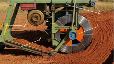 Testing of a 1540 mm diameter inertial rotor on a field test stand: 1 – driven rotor; 2 – hydraulically driven conveyor; 3 – strain gauge frame; 4 – stand cart