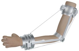 Elbow exoskeleton mounted on the arm